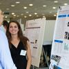 STEM student presenting her research at a poster session.