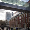 Glass sky bridge connecting two buildings on Temple University's Main Campus.