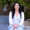 Alexis Mongiello sitting on campus