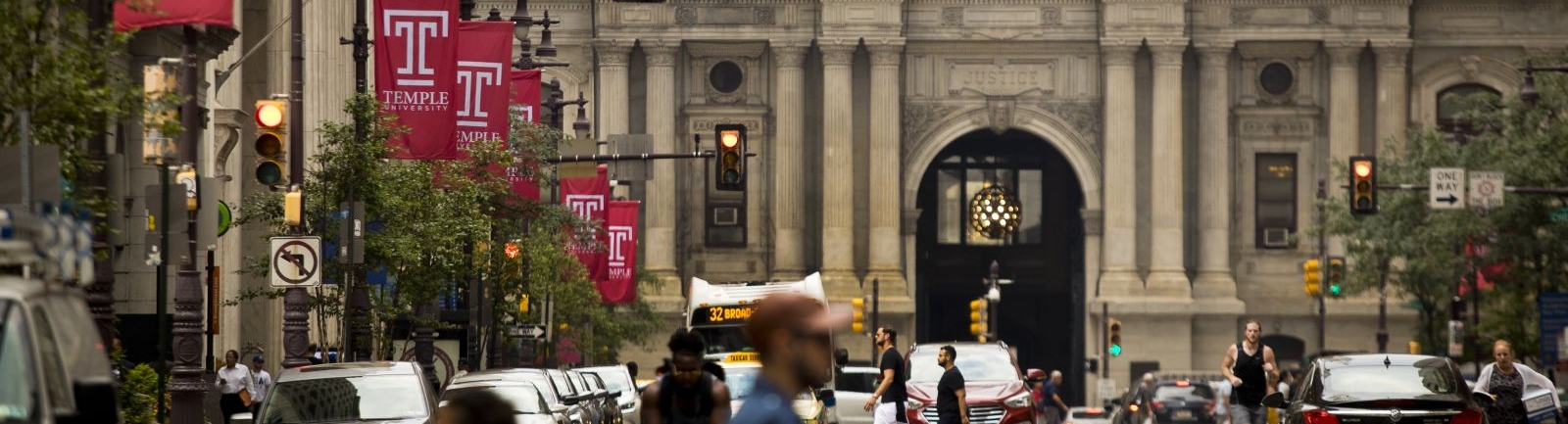 Temple University banners on Broad Street in front of Independence Hall in Philadelphia.